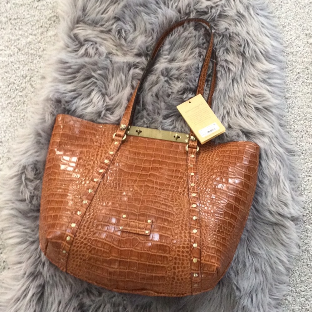 Patricia Nash NWT woman’s golden brown handbag